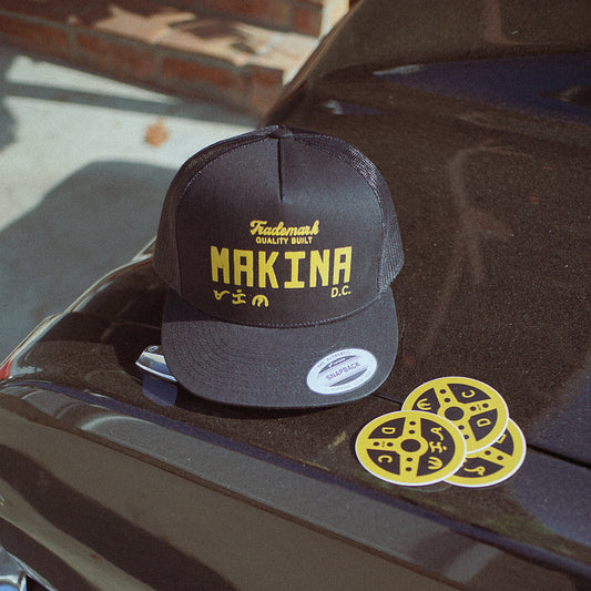 Trademark Quality Built - MAKINA Trucker Hat